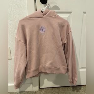 Woman’s pink cropped Dutch bros hoodie